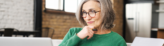 woman looking at computer