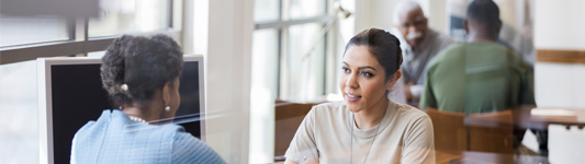 two women conversing