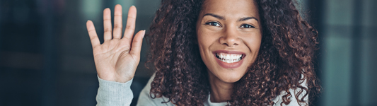 woman waving hello